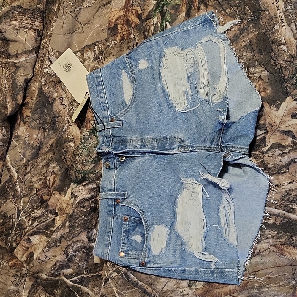 Levi's 501 shorts high rise size 31 and color is a light blue